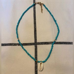 Turquoise Blue Beaded Choker with Puka Shell Pendant
